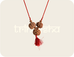 Load image into Gallery viewer, Brown Rudraksha beads with natural textured surface on a red braided string with tassel, Saraswati Bandh mala.
